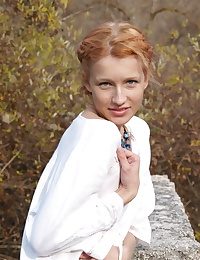 Immaculately dressed in a white dress, Mila portrays a young maiden, unimpressed and innocent with no hint of inhibitions.